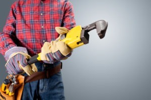 Man holding a plumbing instrument