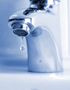 Water dripping out of the tap