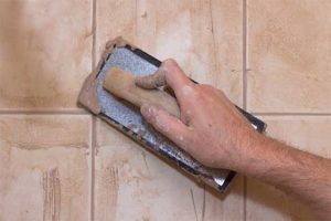 Cleaning the bathroom with brush